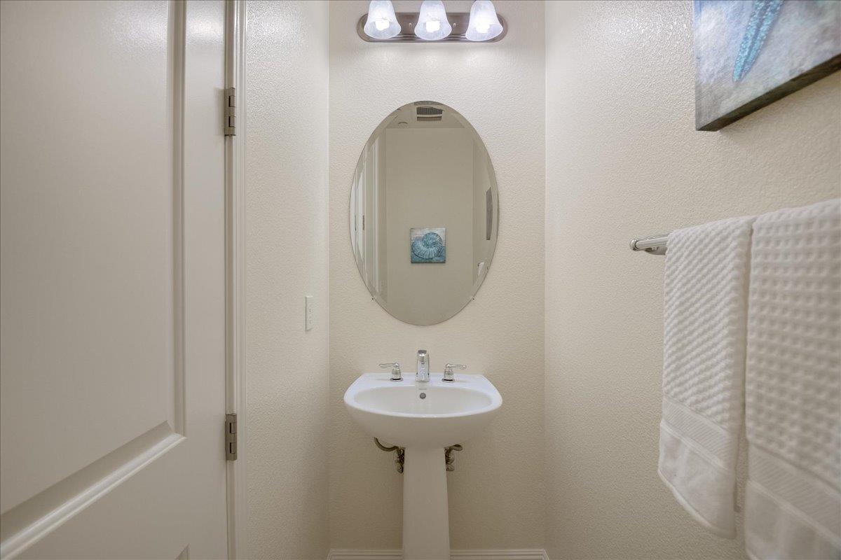 635 True Wind Way, Unit 515 Redwood City, CA 94063 - Photo 21 of 46 a bathroom with a sink and a mirror