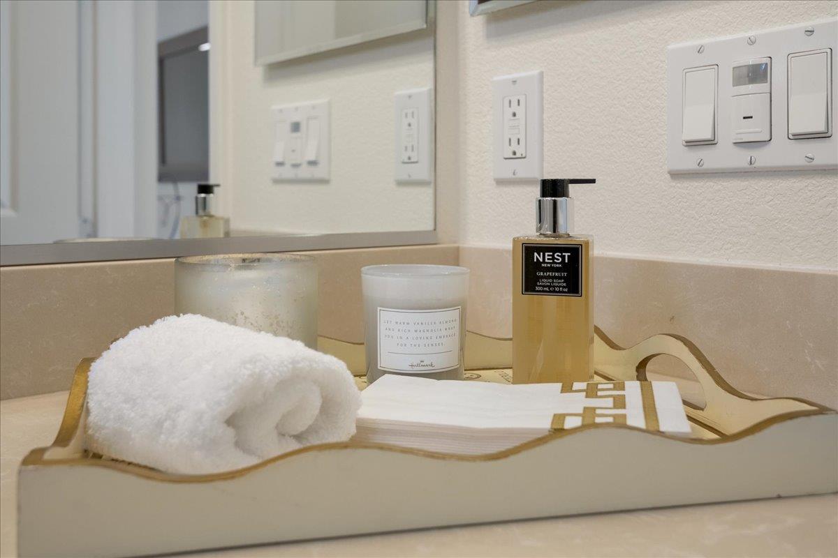 635 True Wind Way, Unit 515 Redwood City, CA 94063 - Photo 26 of 46 a bathroom with a sink and a mirror