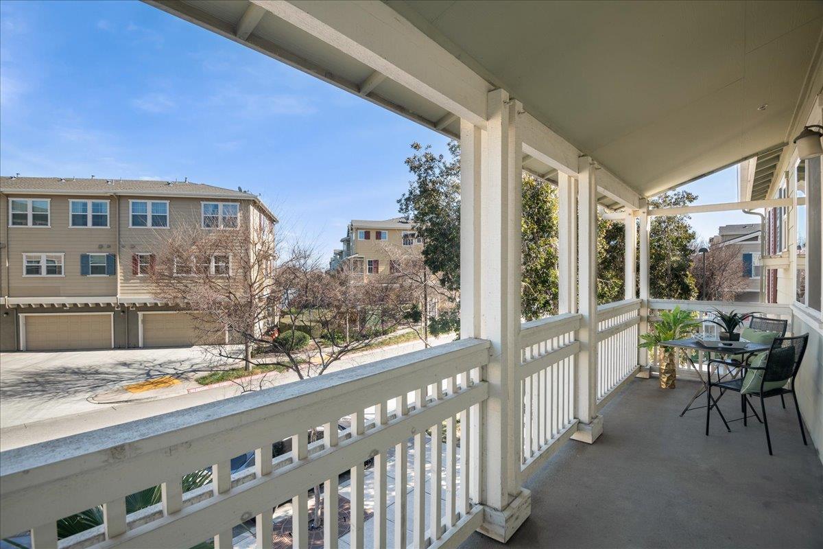 635 True Wind Way, Unit 515 Redwood City, CA 94063 - Photo 38 of 46 a view of a balcony with chairs and tables