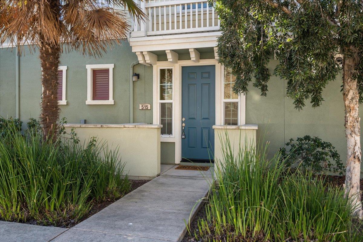 635 True Wind Way, Unit 515 Redwood City, CA 94063 - Photo 4 of 46 a front view of a house with a garden