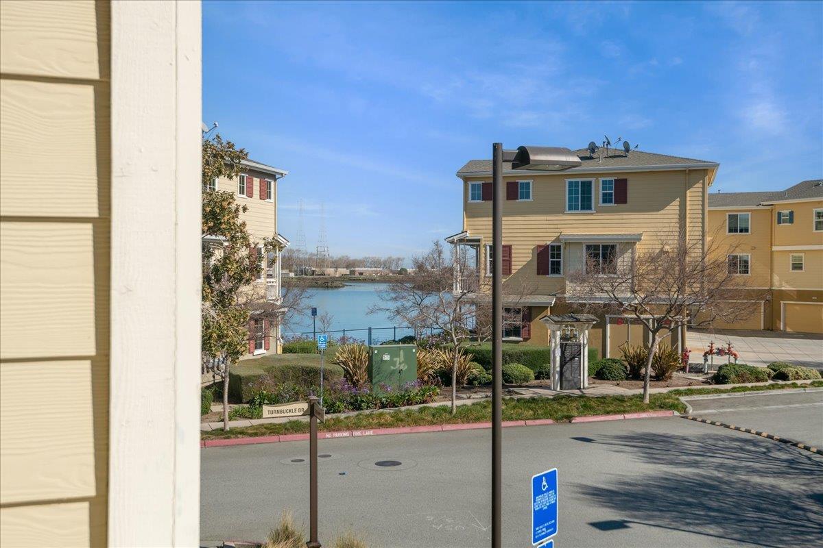 635 True Wind Way, Unit 515 Redwood City, CA 94063 - Photo 42 of 46 a front view of a building with street view