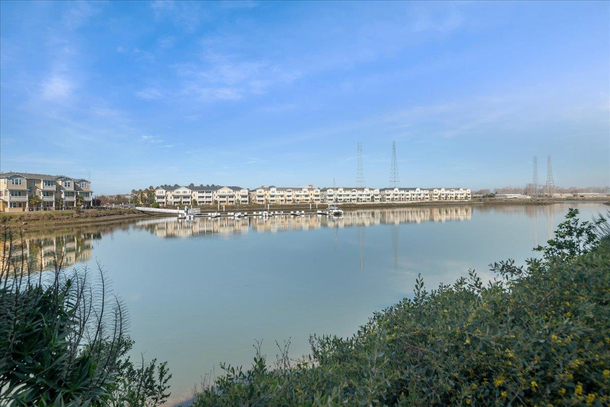 635 True Wind Way, Unit 515 Redwood City, CA 94063 - Photo 43 of 46 a view of a lake with houses