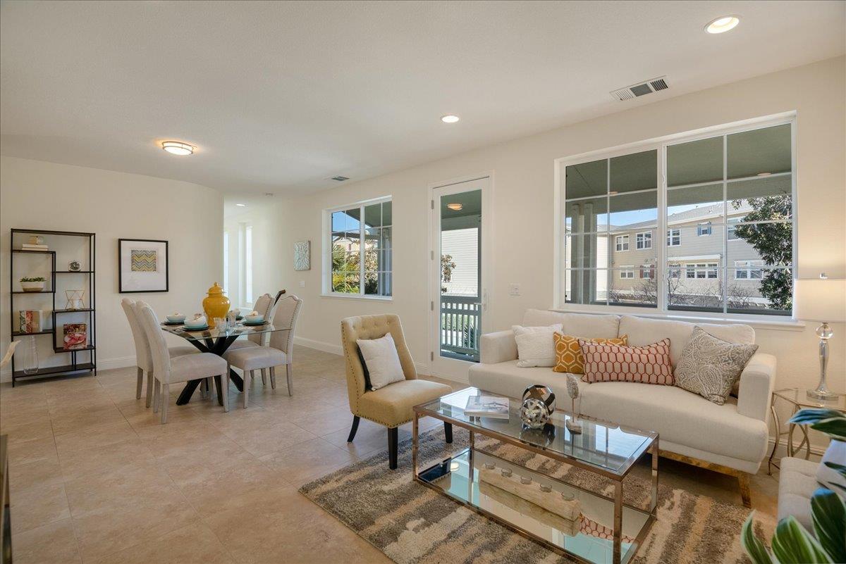 635 True Wind Way, Unit 515 Redwood City, CA 94063 - Photo 8 of 46 a living room with furniture and a large window
