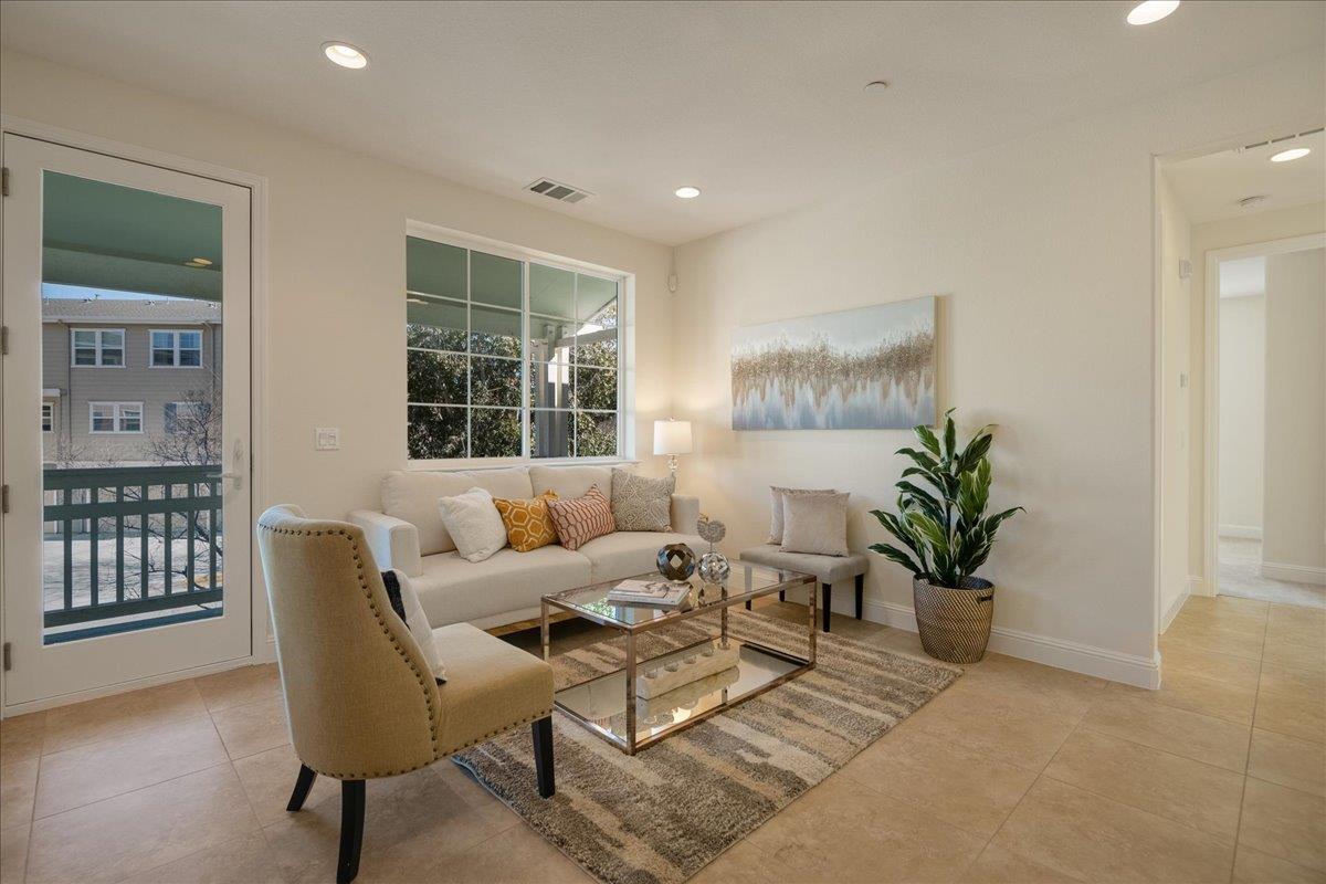 635 True Wind Way, Unit 515 Redwood City, CA 94063 - Photo 9 of 46 a living room with furniture and wooden floor