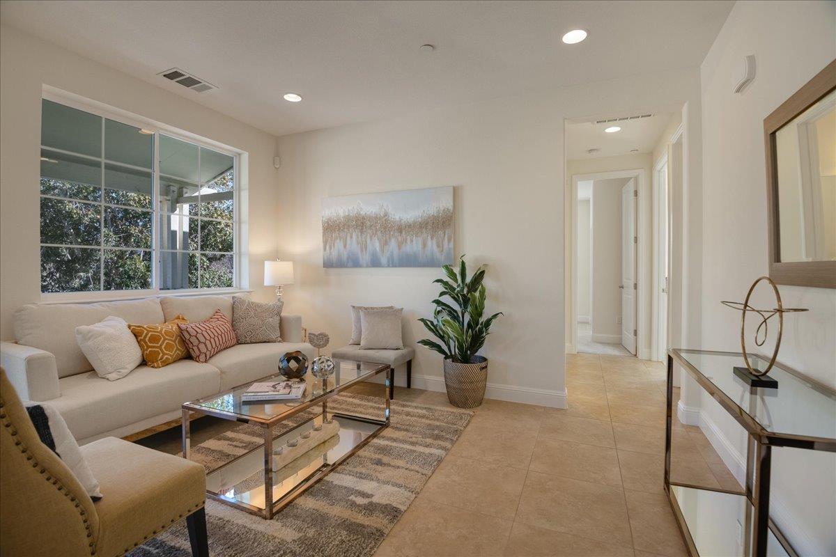 635 True Wind Way, Unit 515 Redwood City, CA 94063 - Photo 10 of 46 a living room with furniture and a large window