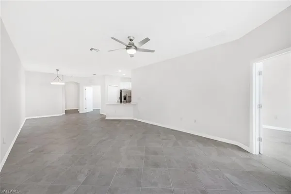 a view of a big room with carpet