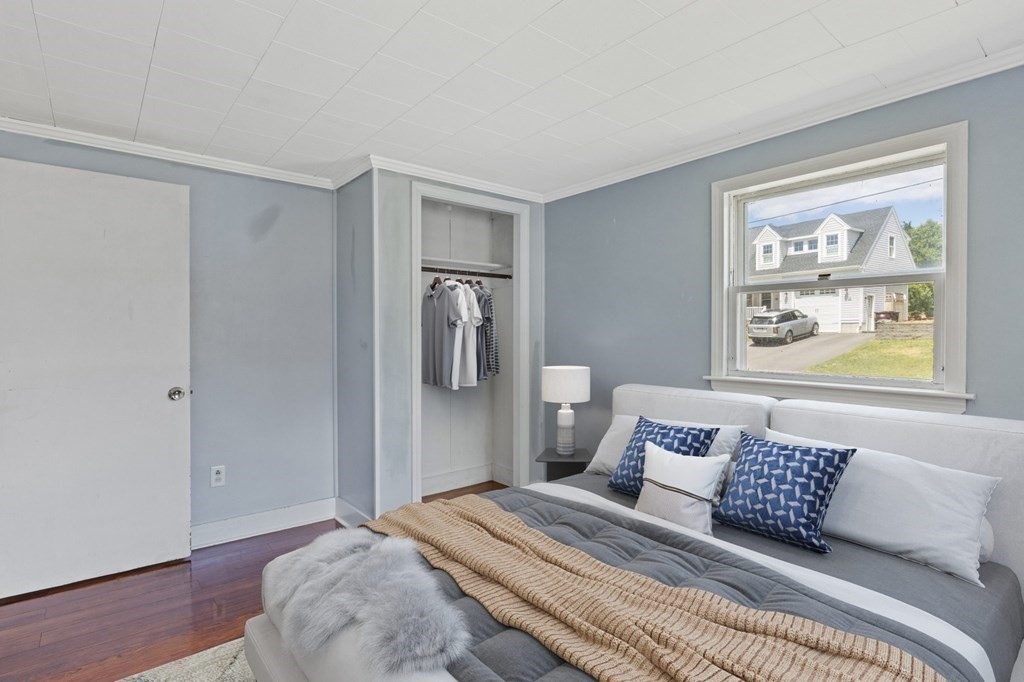 13 Hillcrest Road Scituate, MA 02066 - Photo 18 of 30 a bedroom with a bed and a window