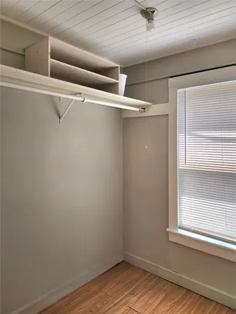 a view of a room with racks on the wall