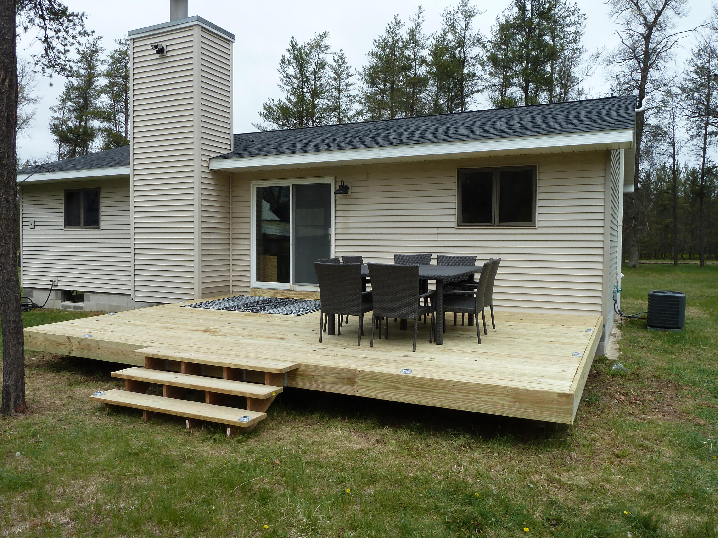 27 East 9 Mile Road Irons, MI 49644 - Photo 3 of 31 back deck