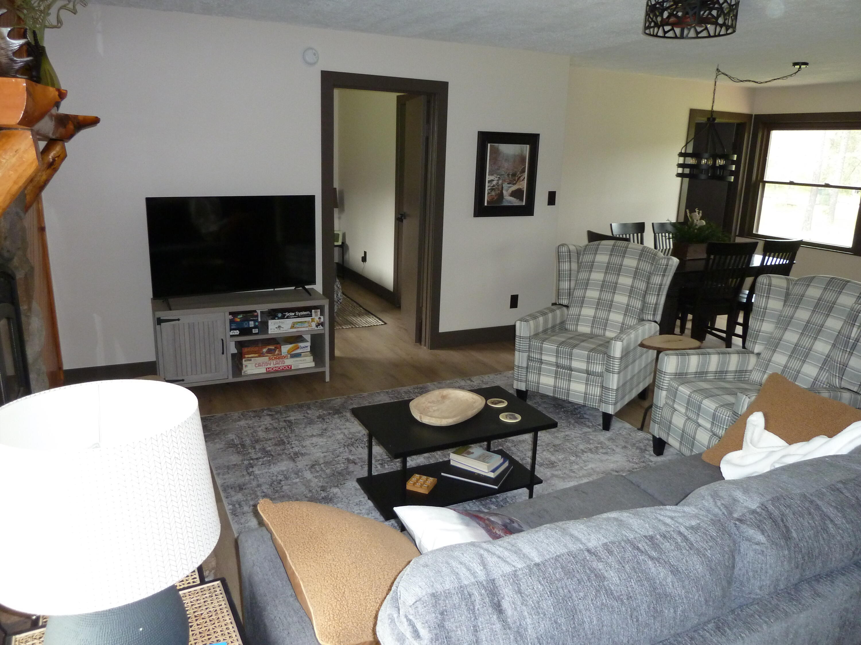 27 East 9 Mile Road Irons, MI 49644 - Photo 7 of 31 living room new 2