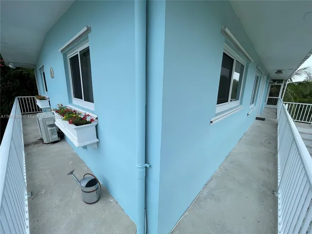 a view of balcony and workspace