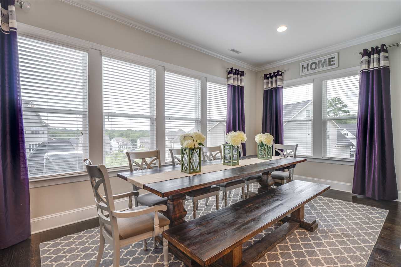 7504 Pinaster Place Raleigh, NC 27613 - Photo 10 of 30 WOW, just look at this breakfast nook! So much natural light Breakfast Area