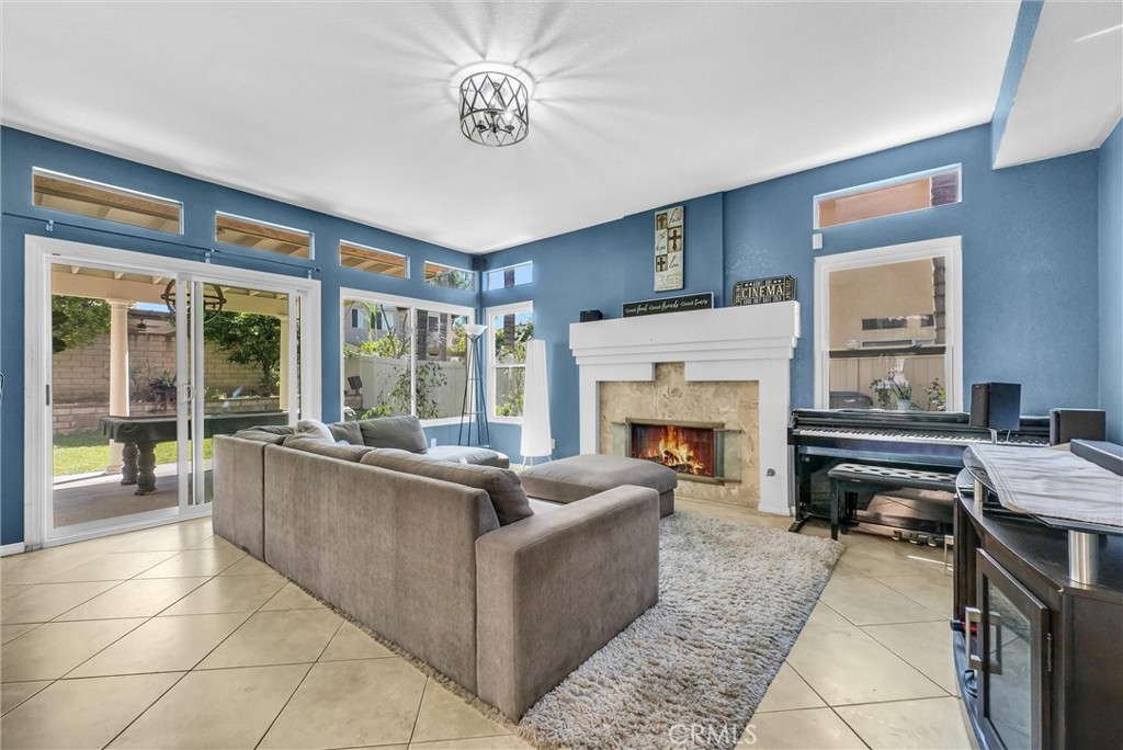 7437 Red Clover Way Highland, CA 92346 - Photo 12 of 33 Family Room with cozy Fireplace