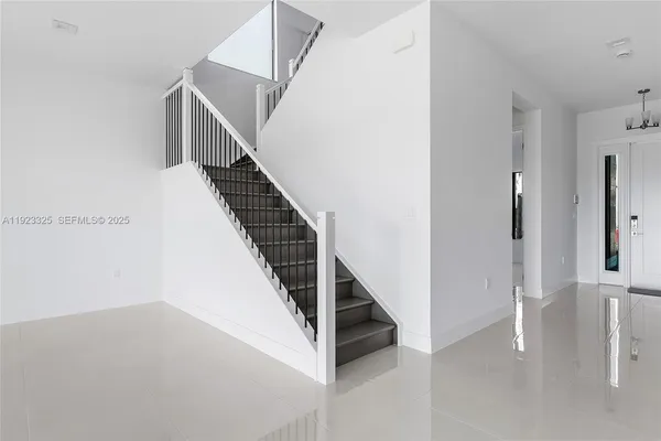 a view of storage and utility room with racks on the wall