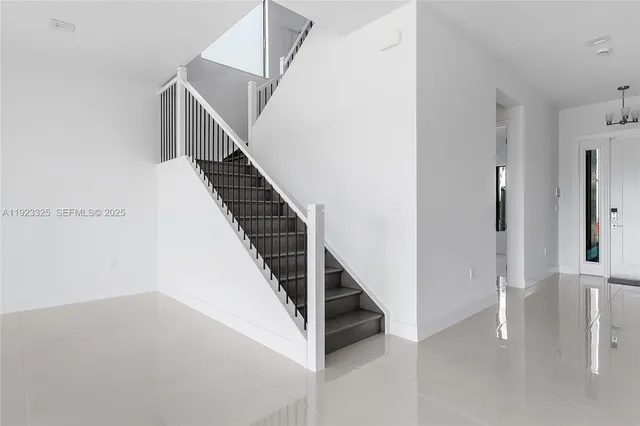 a view of storage and utility room with racks on the wall