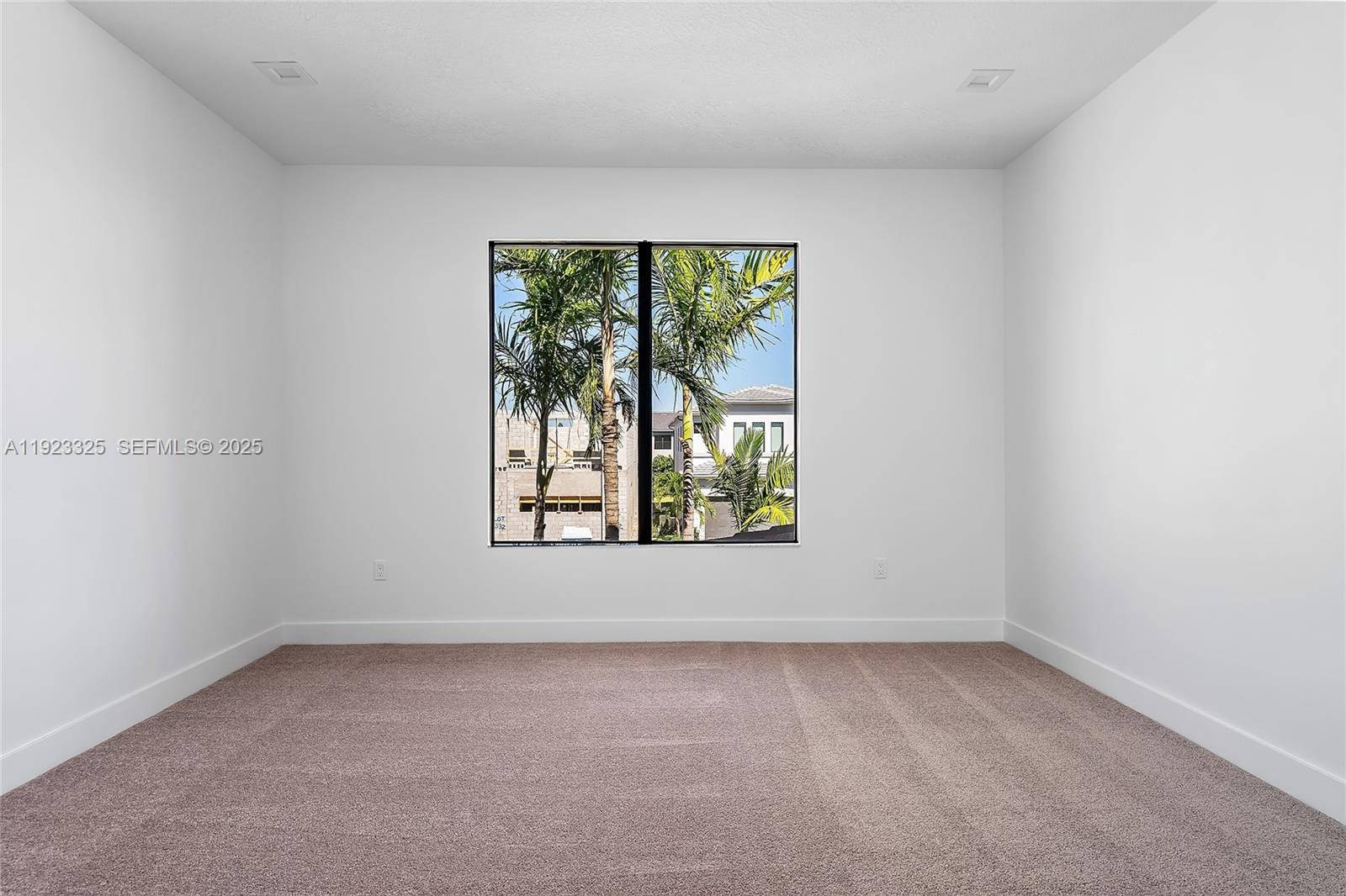 9362 Tulip Leaf Court, Unit 9362 Boca Raton, FL 33434 - Photo 18 of 80 an empty room with a window