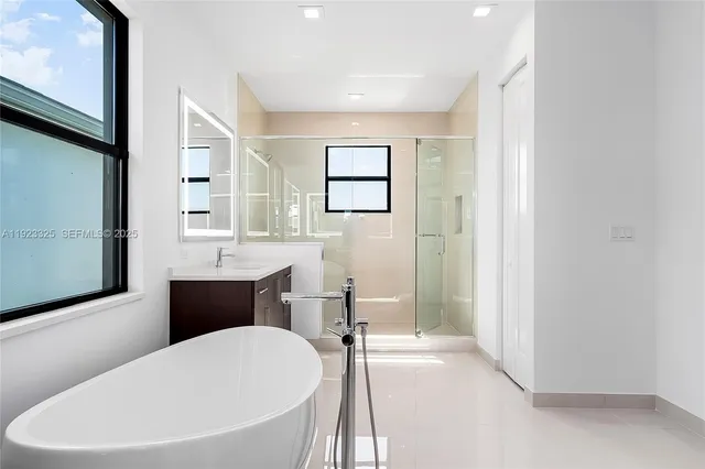 a bathroom with a sink toilet and bathtub