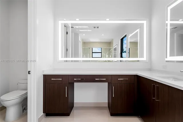 a bathroom with a bathtub and a sink