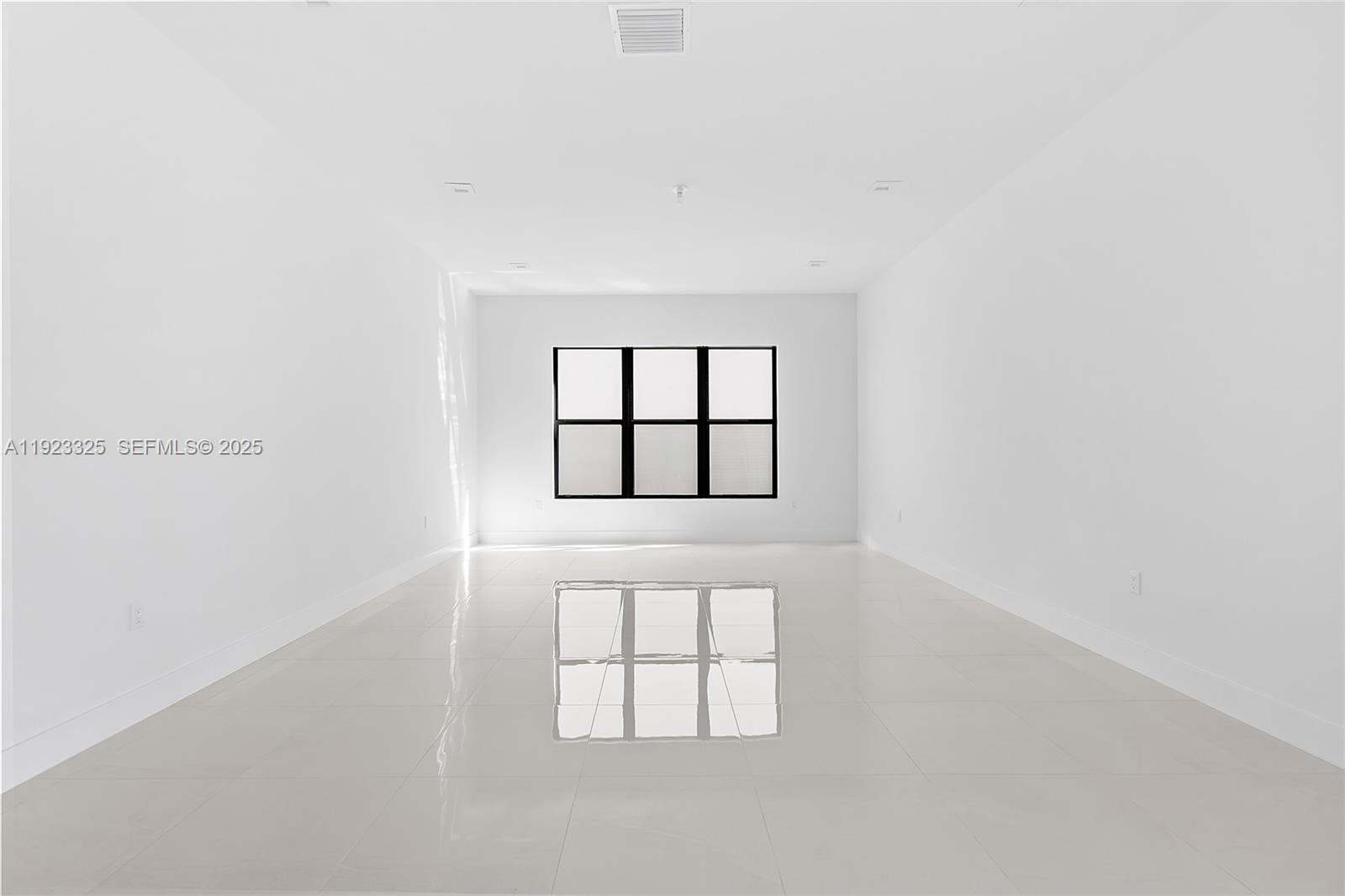 9362 Tulip Leaf Court, Unit 9362 Boca Raton, FL 33434 - Photo 40 of 80 an empty room with windows