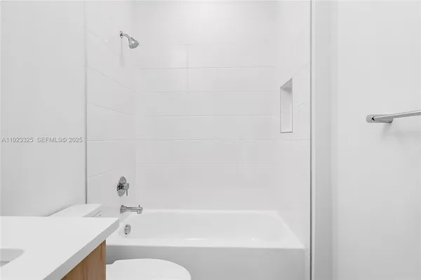 a view of swimming pool with outdoor seating