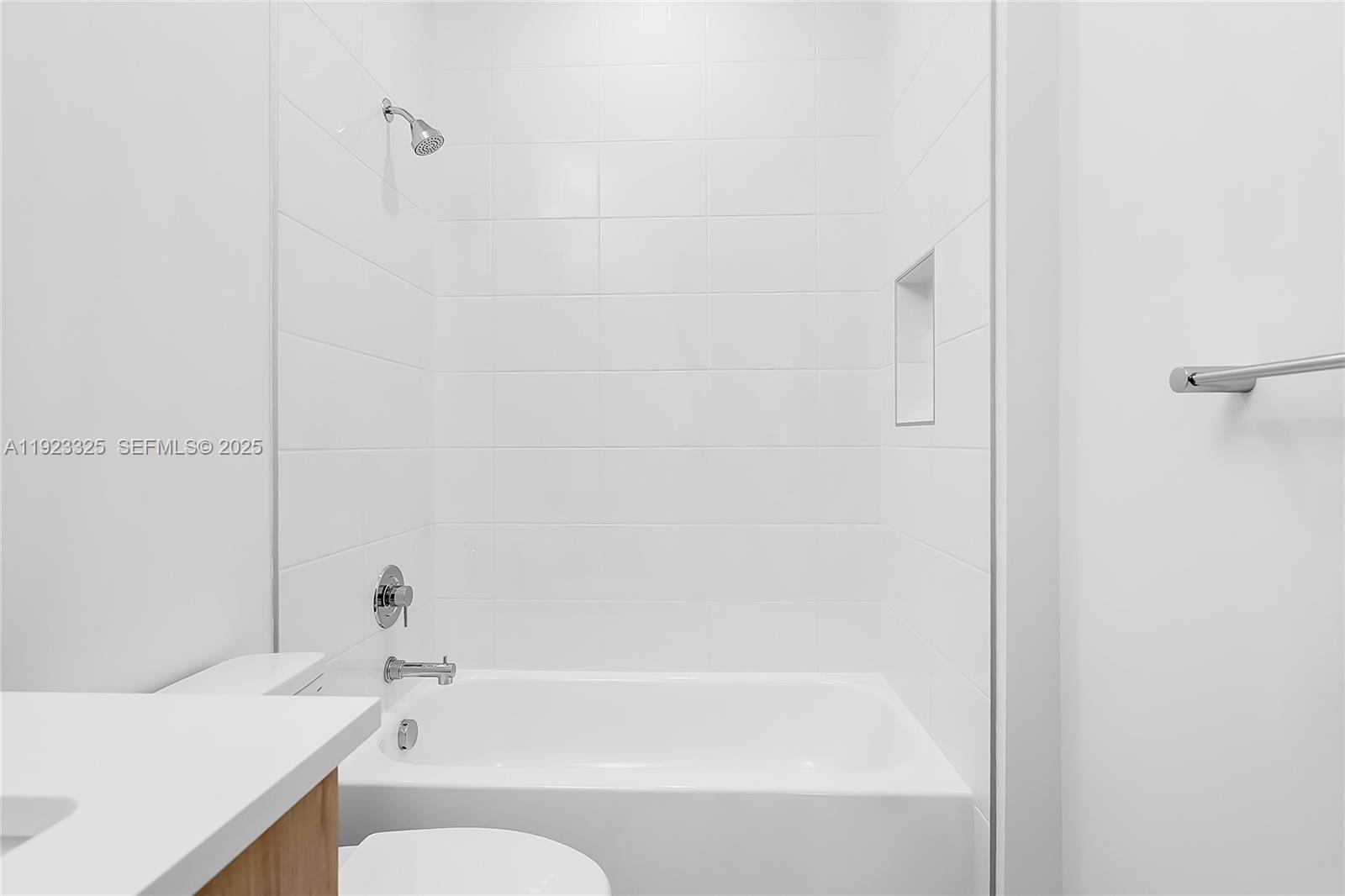 9362 Tulip Leaf Court, Unit 9362 Boca Raton, FL 33434 - Photo 47 of 80 a bathroom with a bathtub and a sink