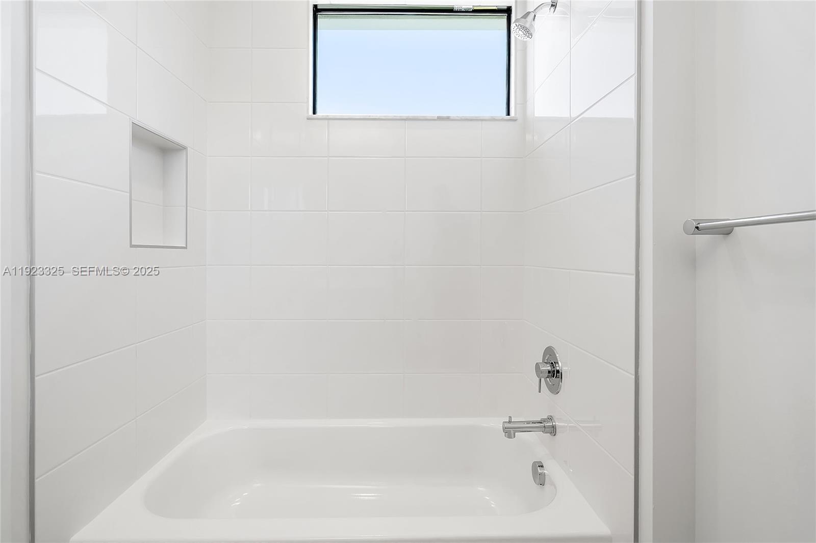 9362 Tulip Leaf Court, Unit 9362 Boca Raton, FL 33434 - Photo 48 of 80 a close up of a bathtub curtain