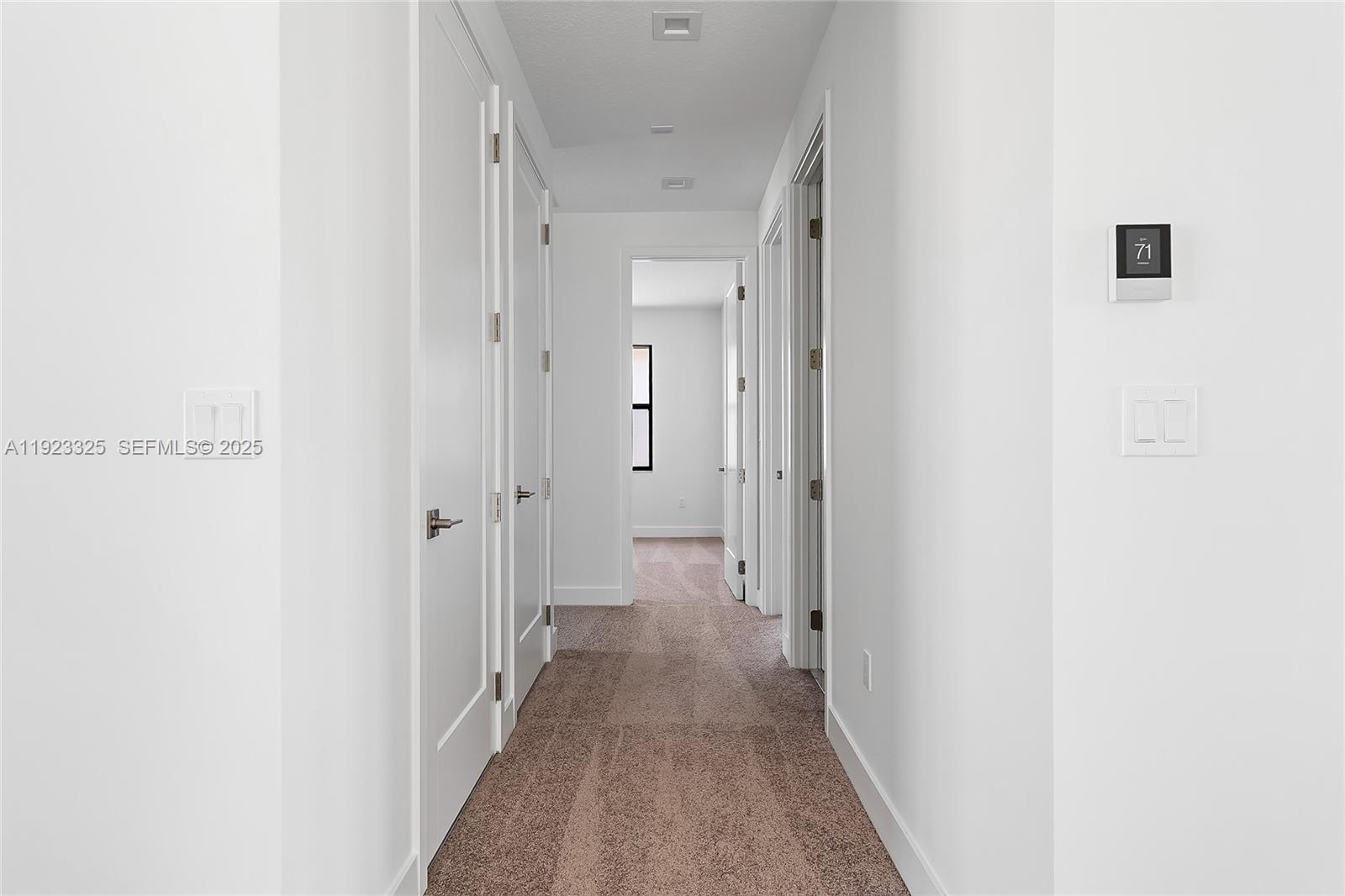 9362 Tulip Leaf Court, Unit 9362 Boca Raton, FL 33434 - Photo 53 of 80 a view of a hallway