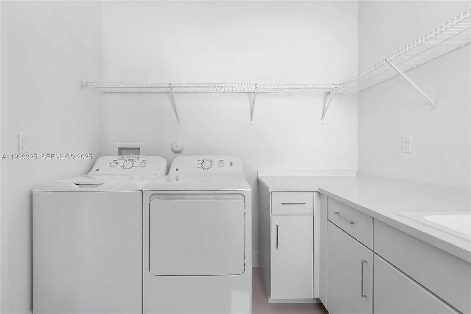 9362 Tulip Leaf Court, Unit 9362 Boca Raton, FL 33434 - Photo 54 of 80 a utility room with dryer and washer