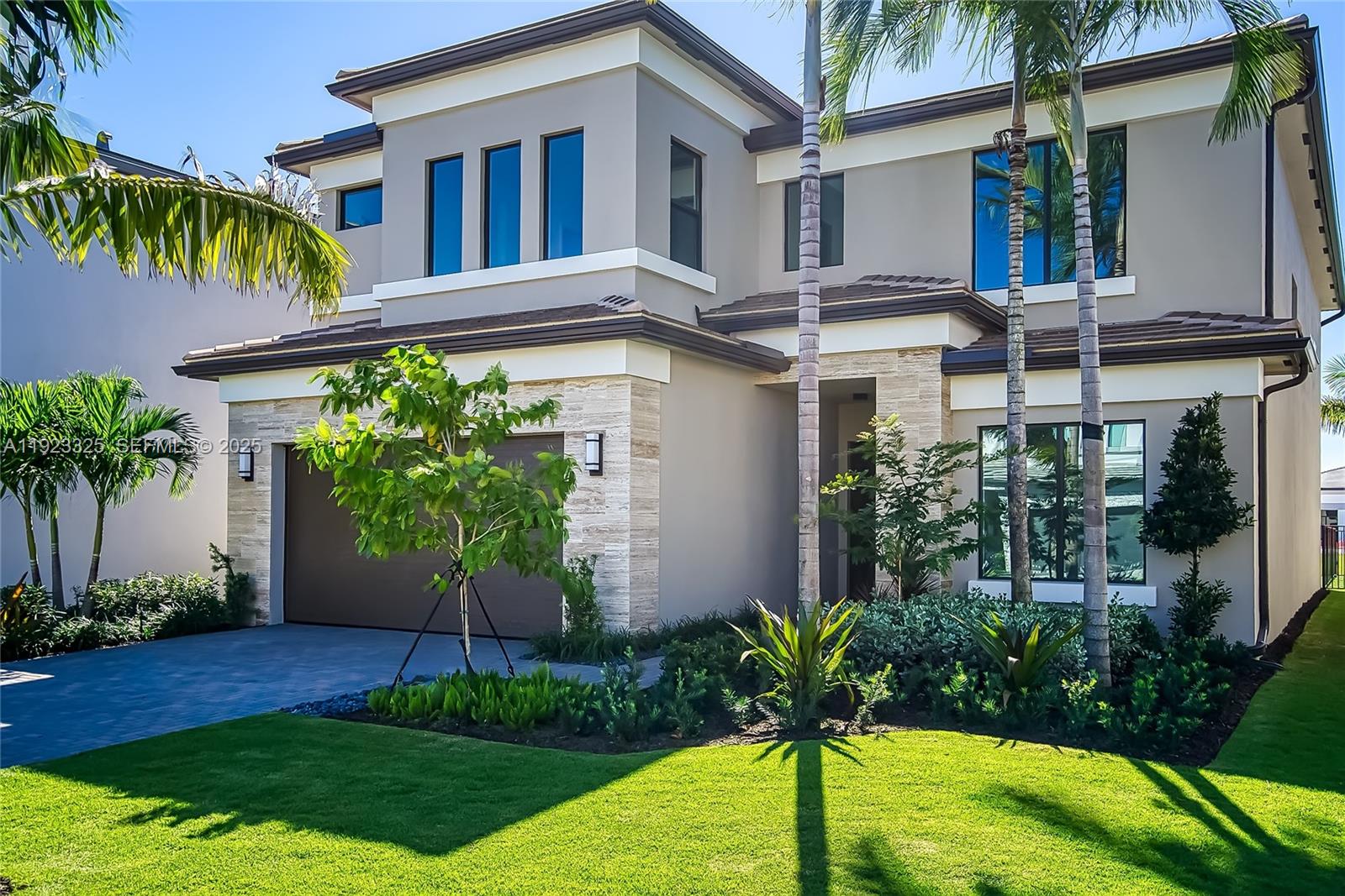 9362 Tulip Leaf Court, Unit 9362 Boca Raton, FL 33434 - Photo 71 of 80 a front view of a house with garden