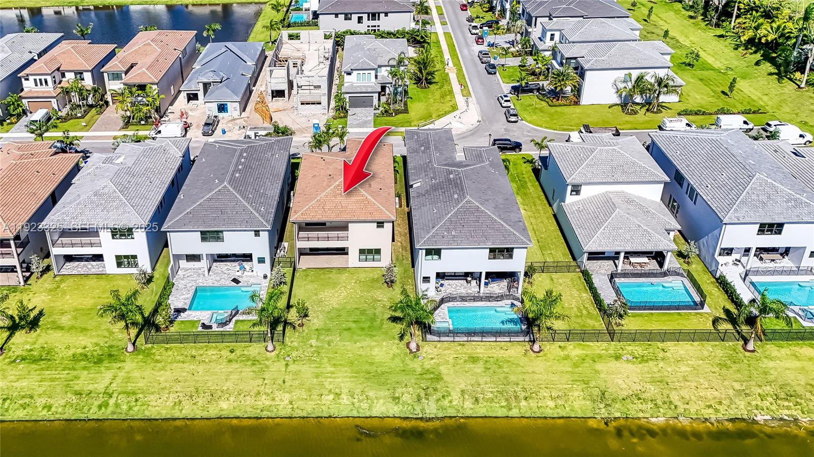 9362 Tulip Leaf Court, Unit 9362 Boca Raton, FL 33434 - Photo 76 of 80 an aerial view of residential houses with swimming pool