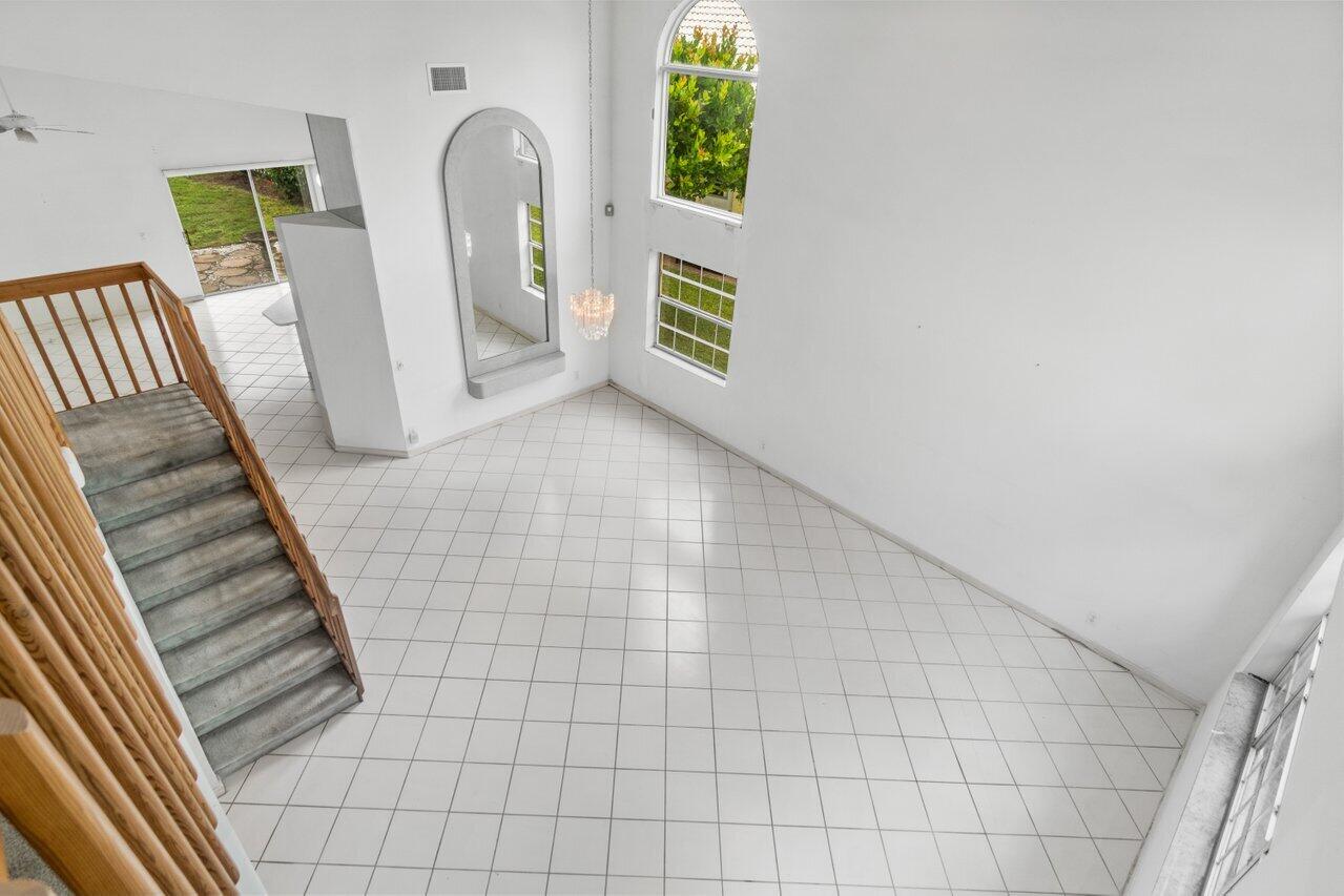 8501 Windy Circle Boynton Beach, FL 33472 - Photo 22 of 33 Veiw of living/dining room from loft