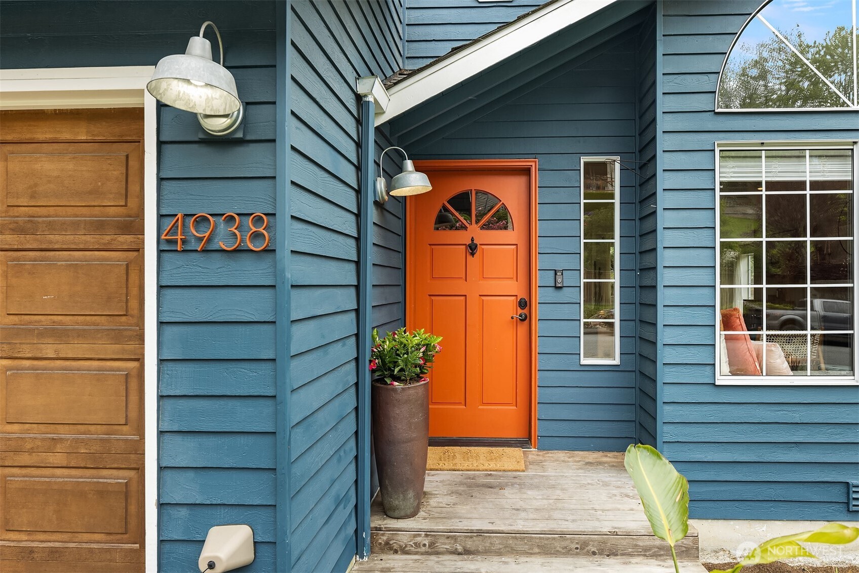 4938 Narbeck Avenue Everett, WA 98203 - Photo 2 of 40 a front view of a house with a garden