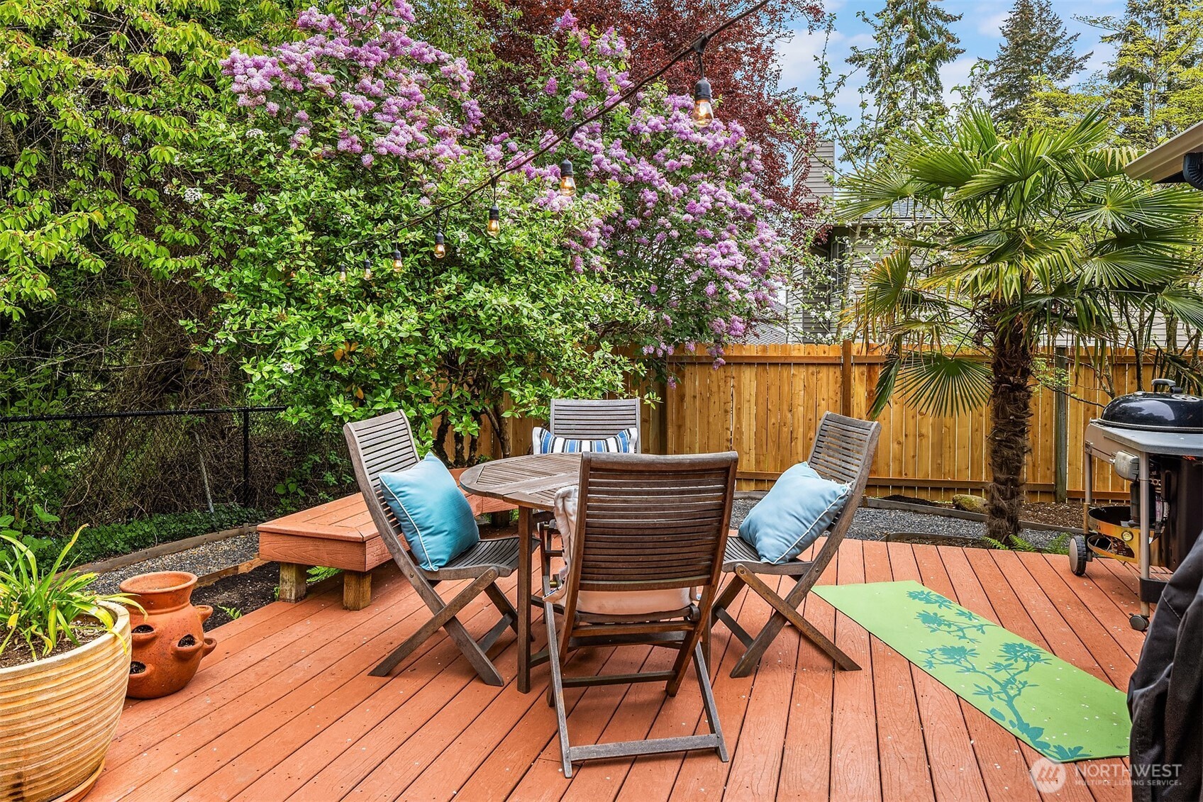 4938 Narbeck Avenue Everett, WA 98203 - Photo 27 of 40 a patio with water view fountain and wooden floor