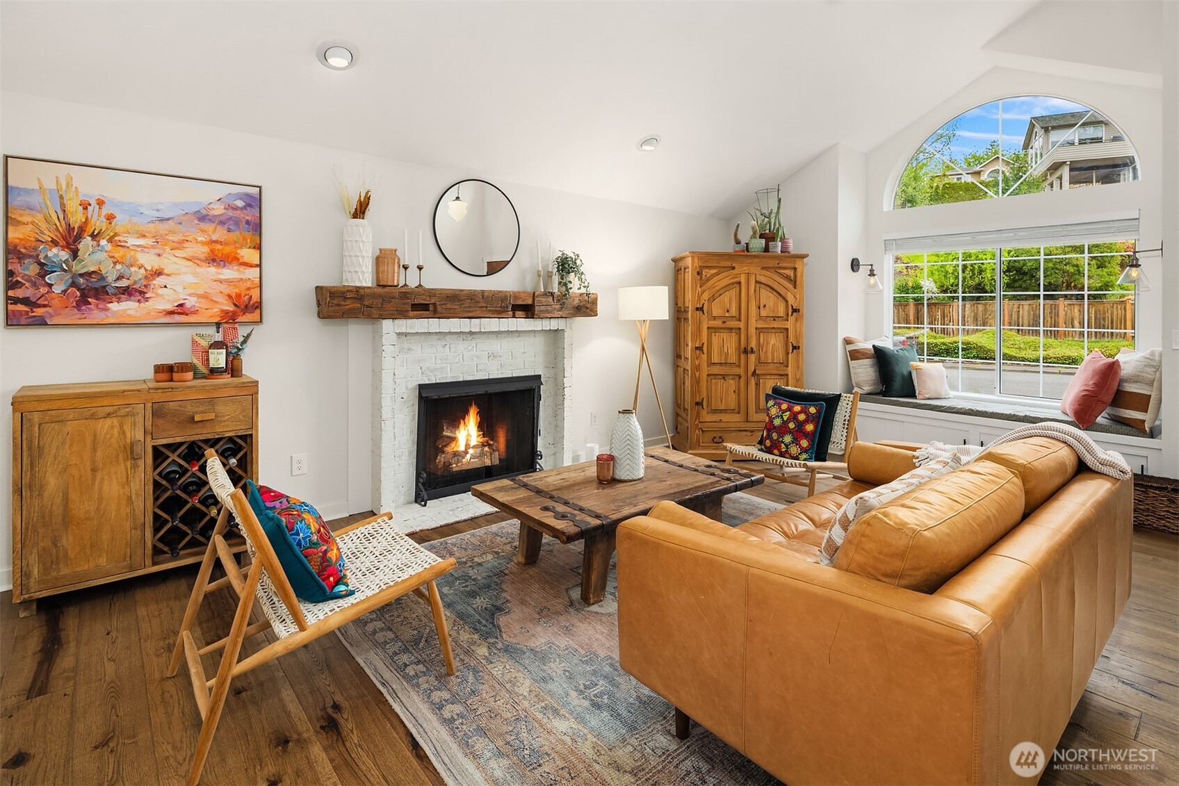 4938 Narbeck Avenue Everett, WA 98203 - Photo 6 of 40 a living room with furniture a fireplace and a large window