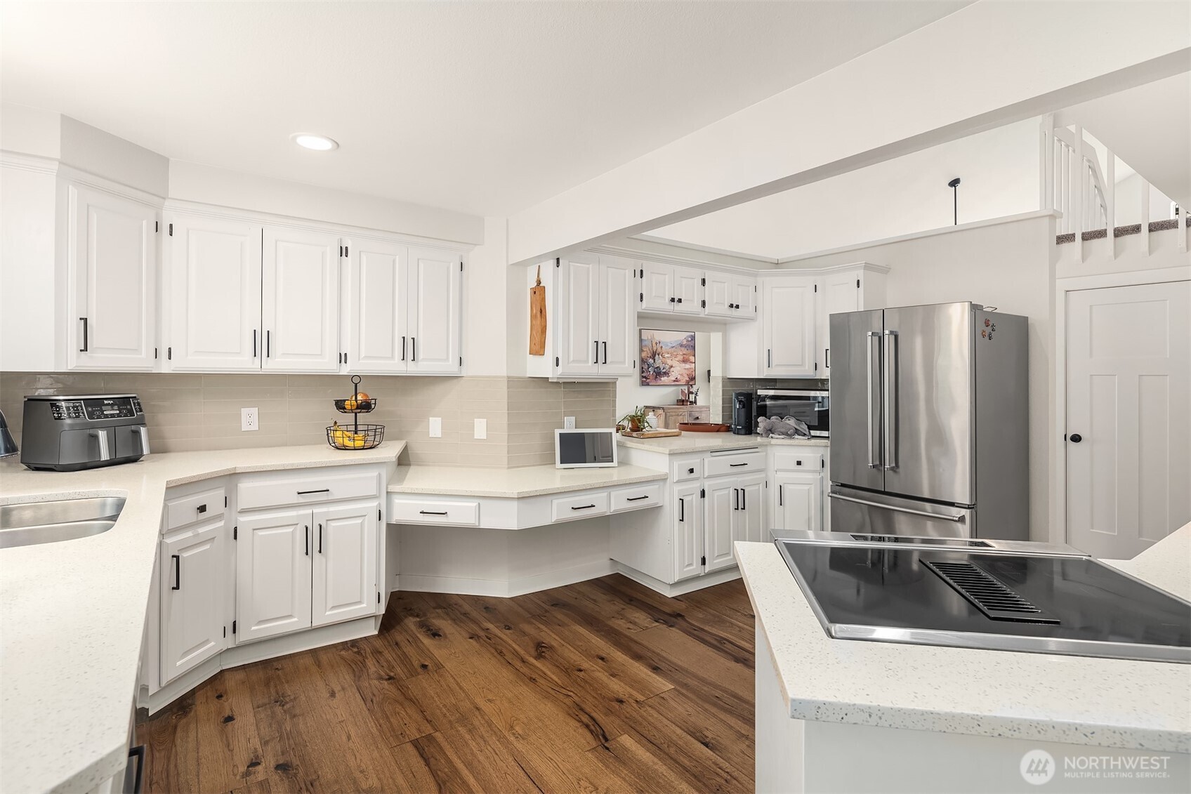 4938 Narbeck Avenue Everett, WA 98203 - Photo 8 of 40 a kitchen with white cabinets and stainless steel appliances