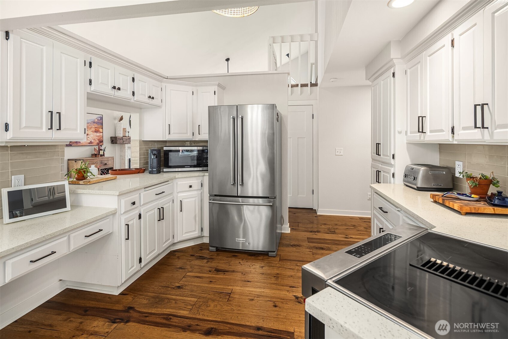 4938 Narbeck Avenue Everett, WA 98203 - Photo 9 of 40 a kitchen with stainless steel appliances a stove a sink and a refrigerator
