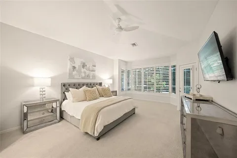 a view of storage and utility room with washer and dryer