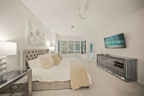 a living room with furniture and a garden