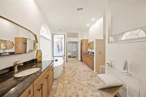 a view of a backyard with a swimming pool