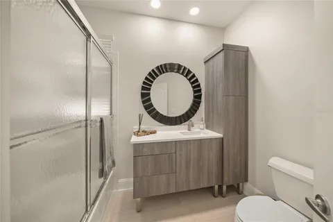 an aerial view of a house with a garden