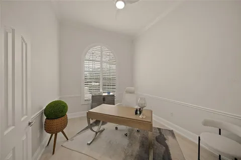 a view of walk in closet with clothes