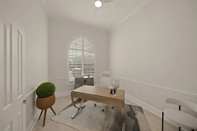 a view of walk in closet with clothes