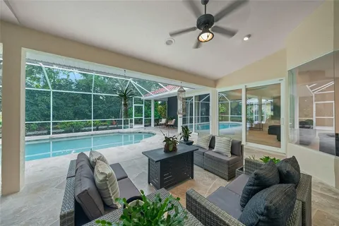 a view of house with garden space and trees