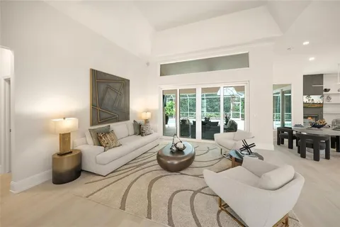 a kitchen with a table and chairs in it