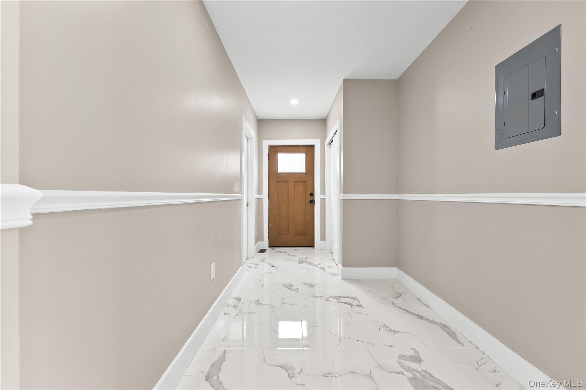 311 Lyon Street Valley Stream, NY 11580 - Photo 21 of 45 a view of a big room with an empty space