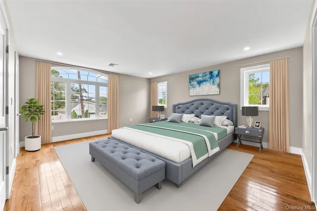 a bedroom with a balcony a bed and a potted plant