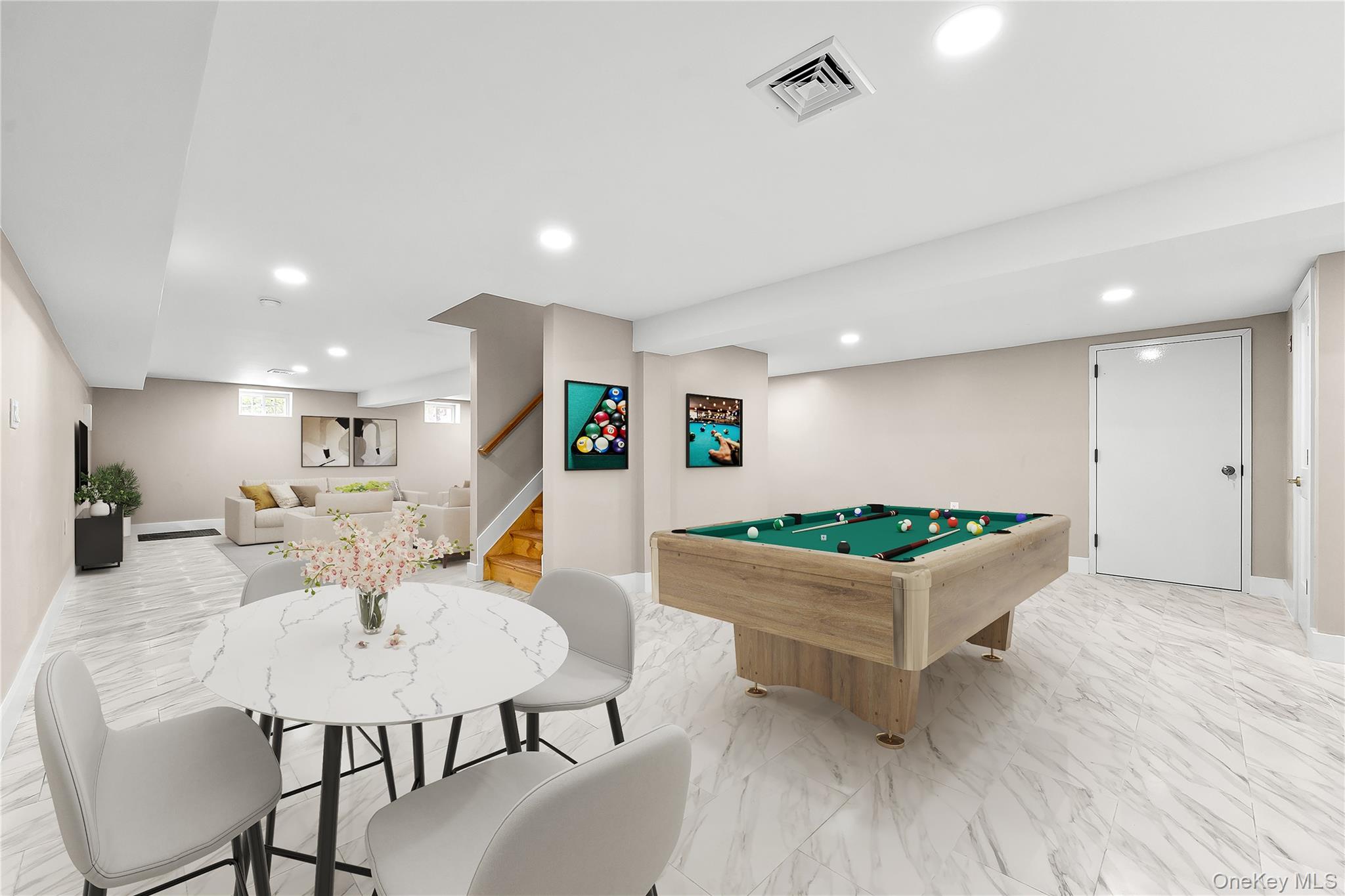 311 Lyon Street Valley Stream, NY 11580 - Photo 41 of 45 a living room with furniture and wooden floor