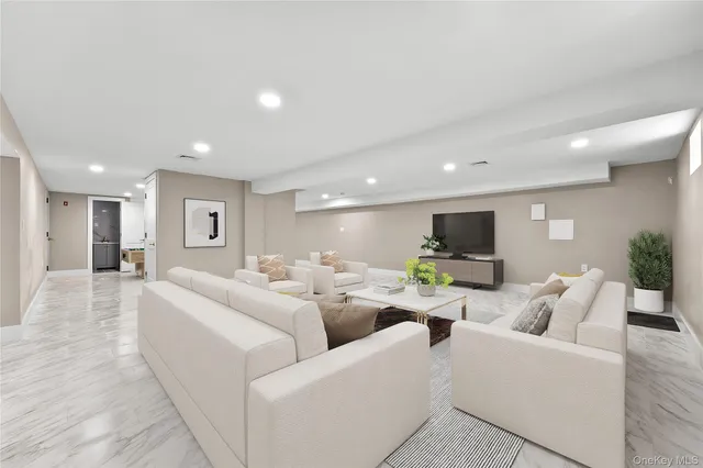 a bathroom with a sink toilet vanity and shower