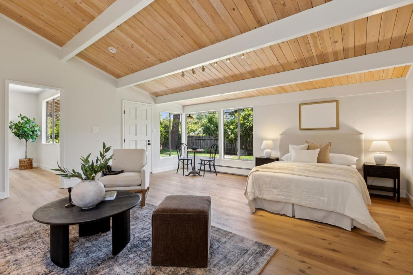 755 Santa Rita Avenue Los Altos, CA 94022 - Photo 23 of 50 a bedroom with furniture and a large window