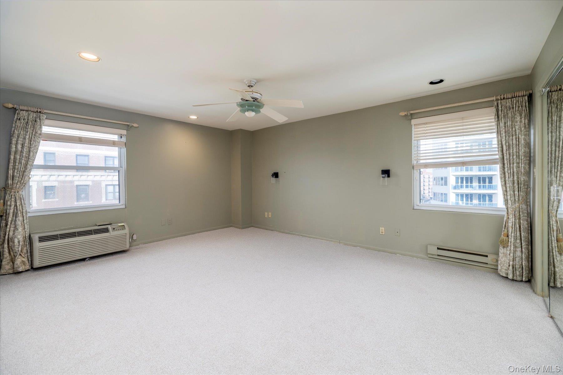 360 Shore Road, Unit 6L & 6M Long Beach, NY 11561 - Photo 19 of 28 an empty room with windows